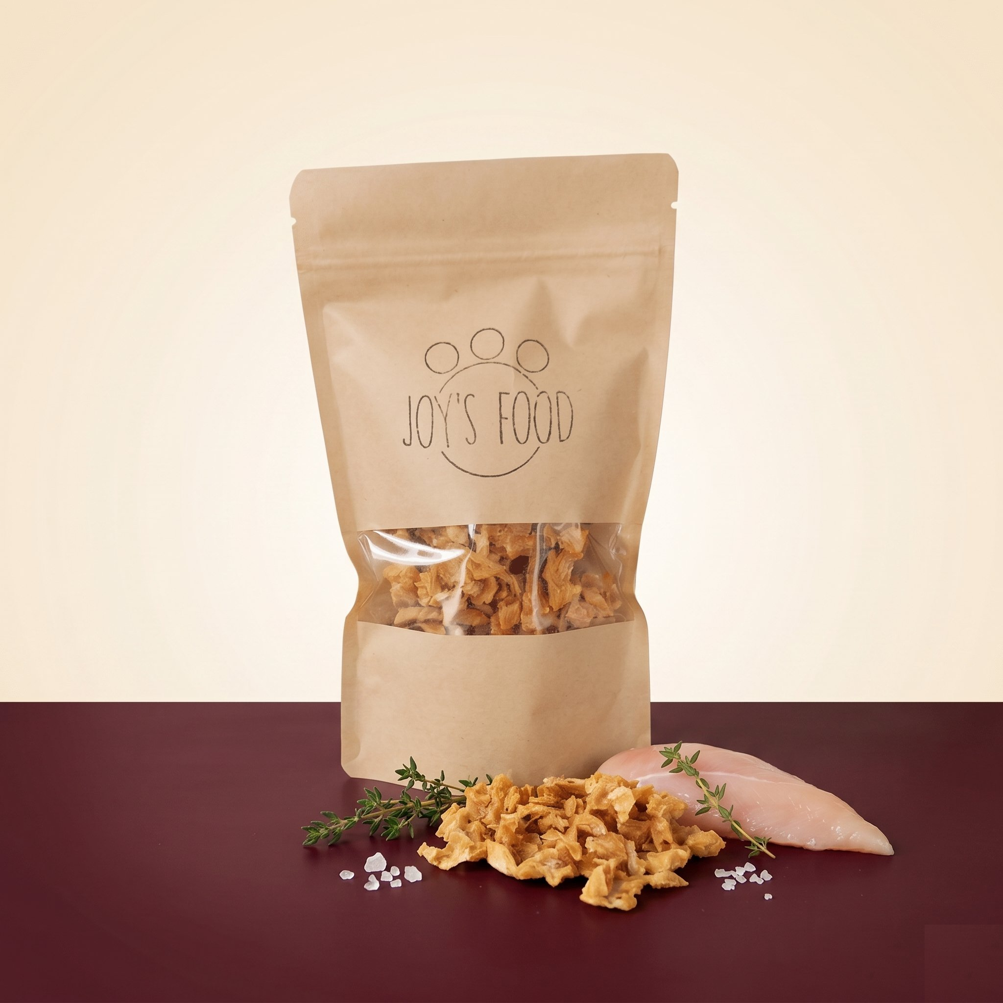 Friandises pour chien et chat – Crispi Poulet Joy's Food, filet de poulet suisse séché, sachet kraft avec fenêtre, MonAnimalGourmet.ch
